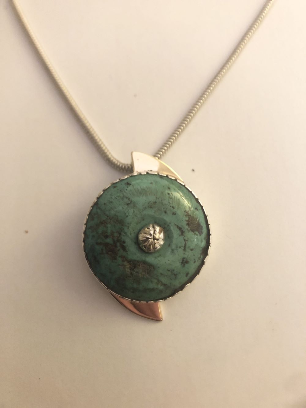 S.Grieve Stylised green and gold pendant